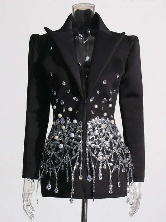 Beyoncé - Vestido blazer con diamantes empalmados