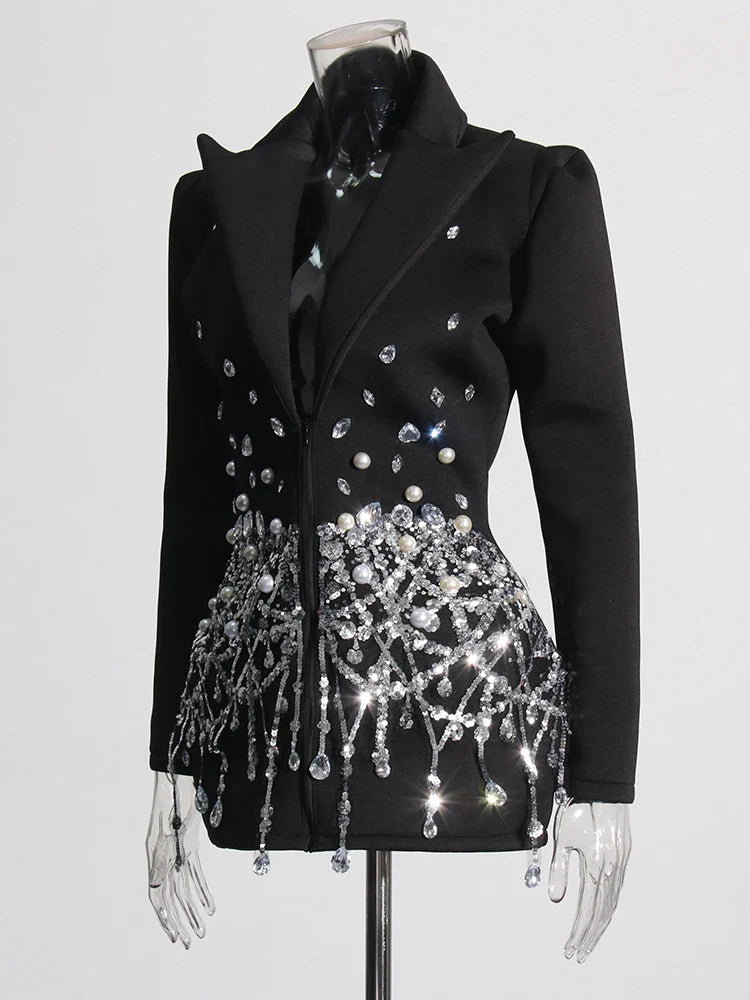 Beyoncé - Vestido blazer con diamantes empalmados