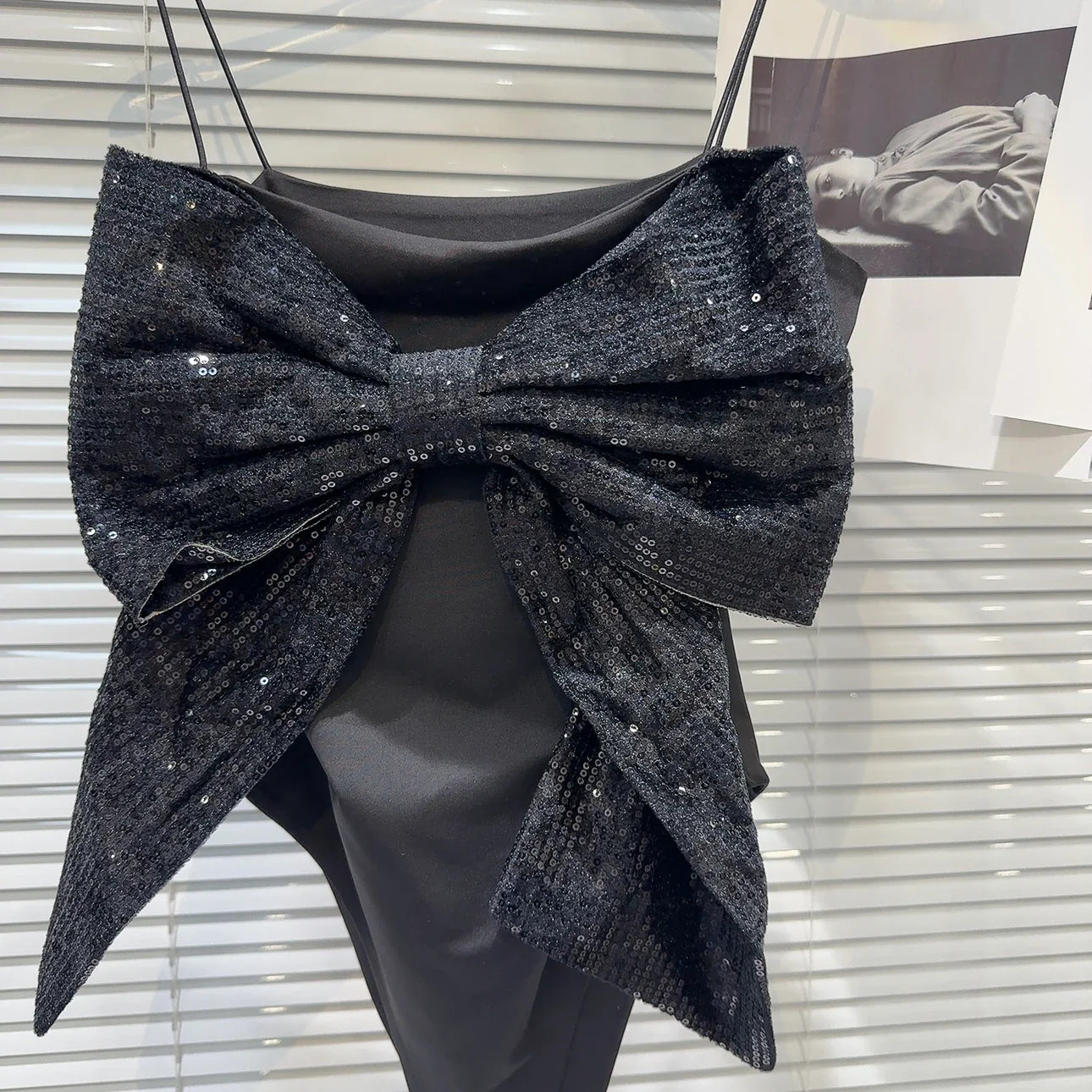 Davinia - Top con lazo grande y lentejuelas