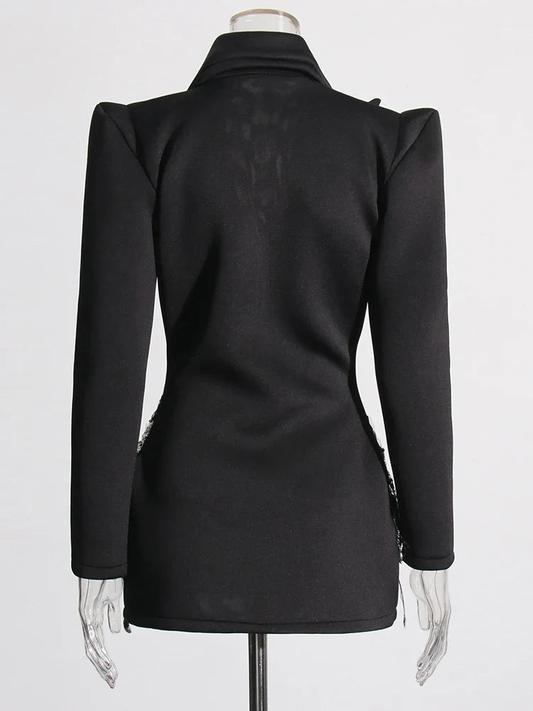 Beyoncé - Vestido blazer con diamantes empalmados